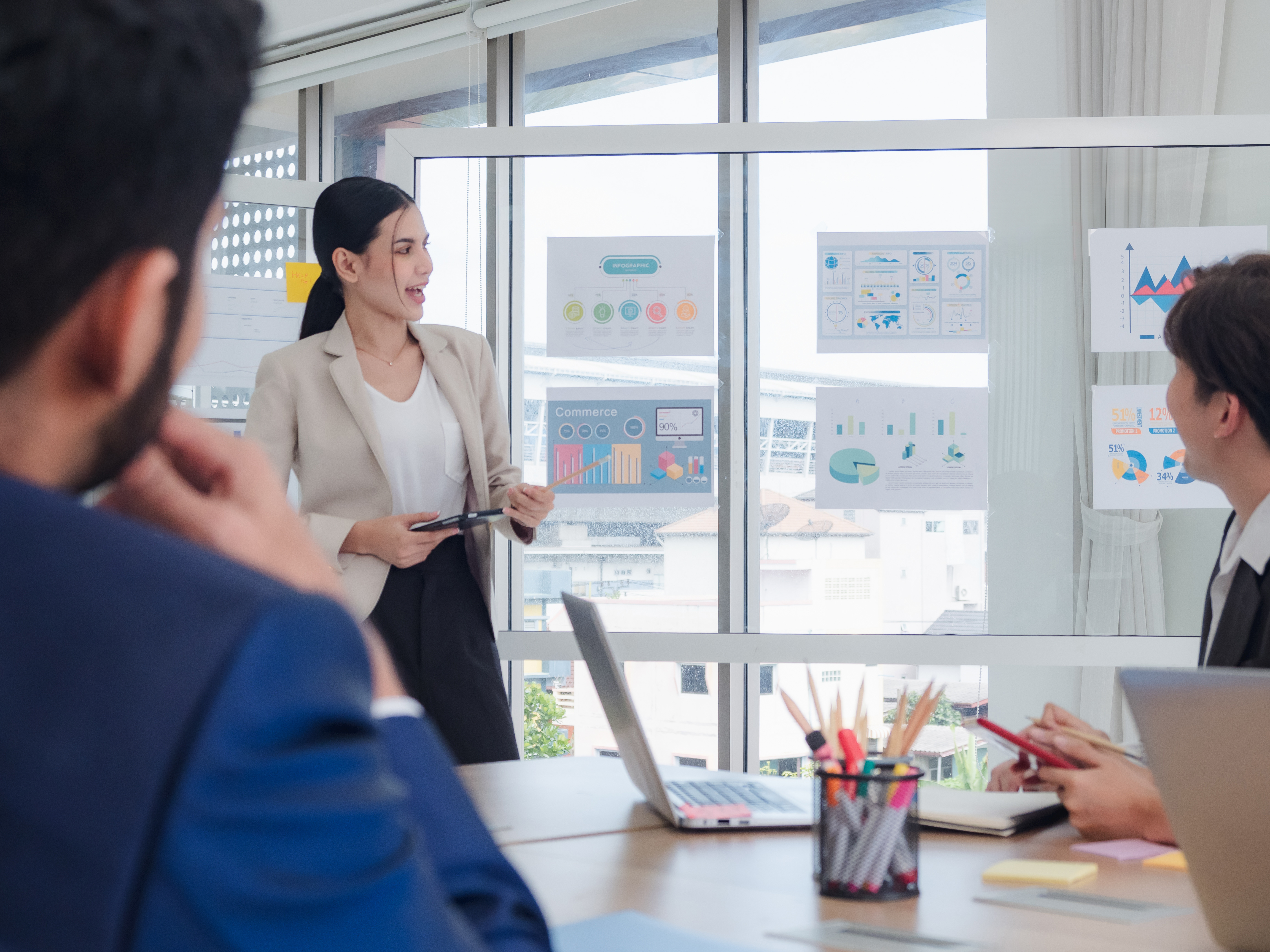 Woman leading presentation in office