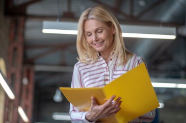 Woman looking at a folder