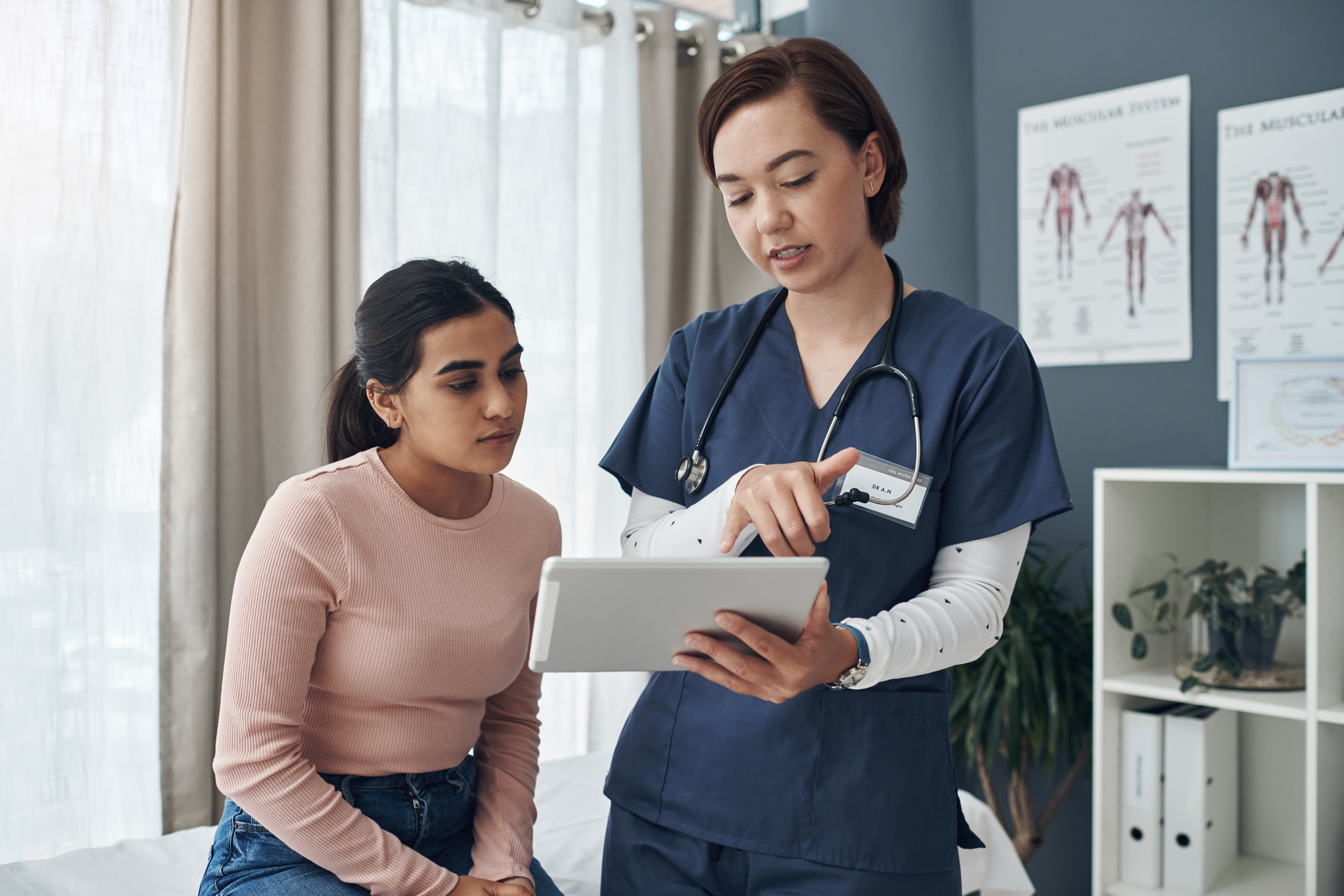 Young woman with doctor