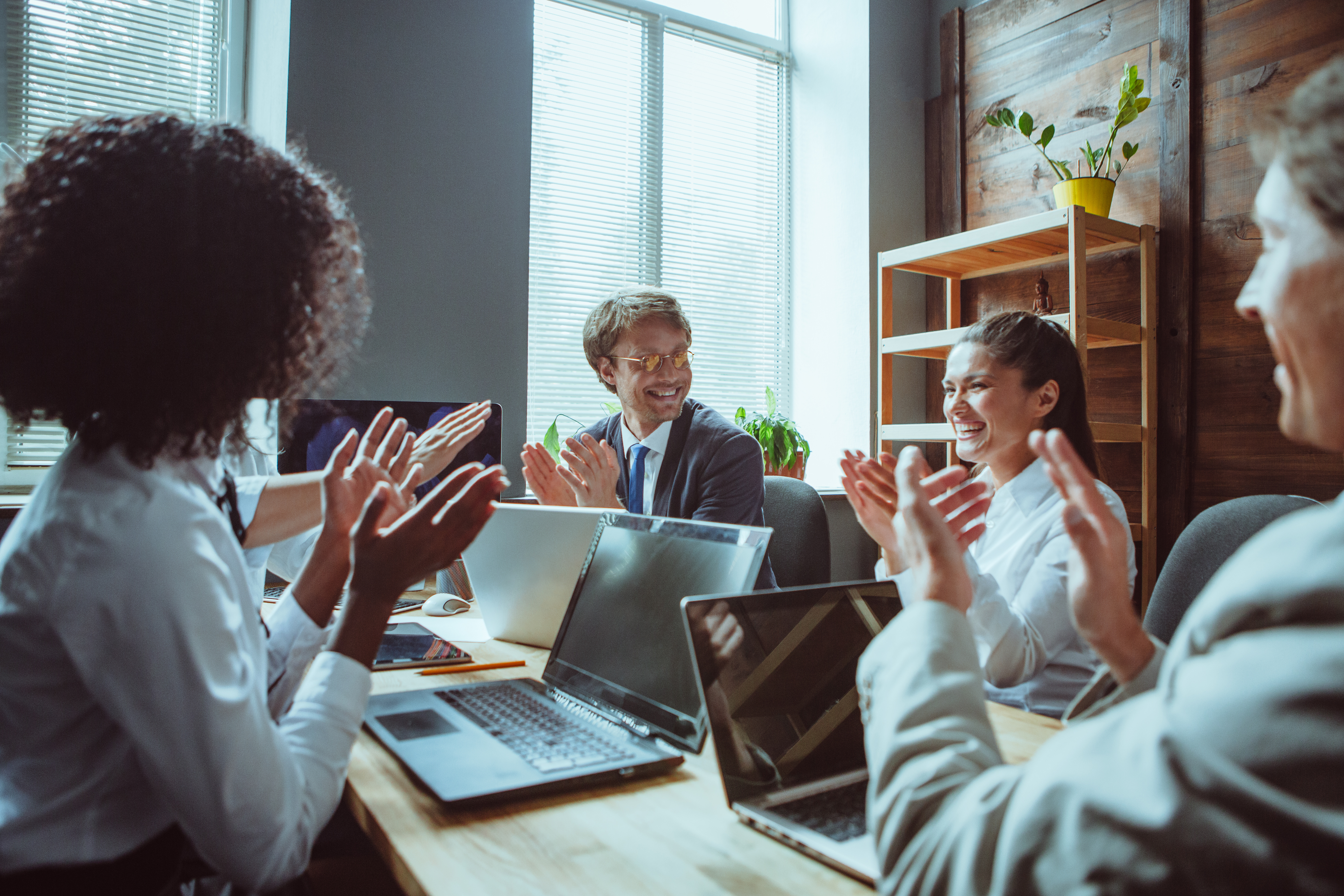 Group of happy employees in office