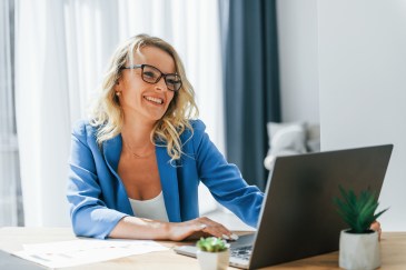 Woman sitting at the computer working