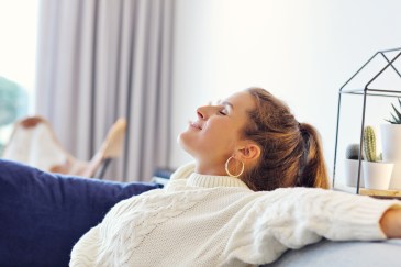 Woman resting on the couch