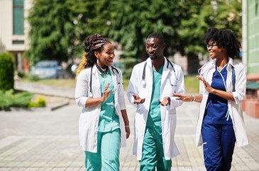 Nurses walking out of the hospital together