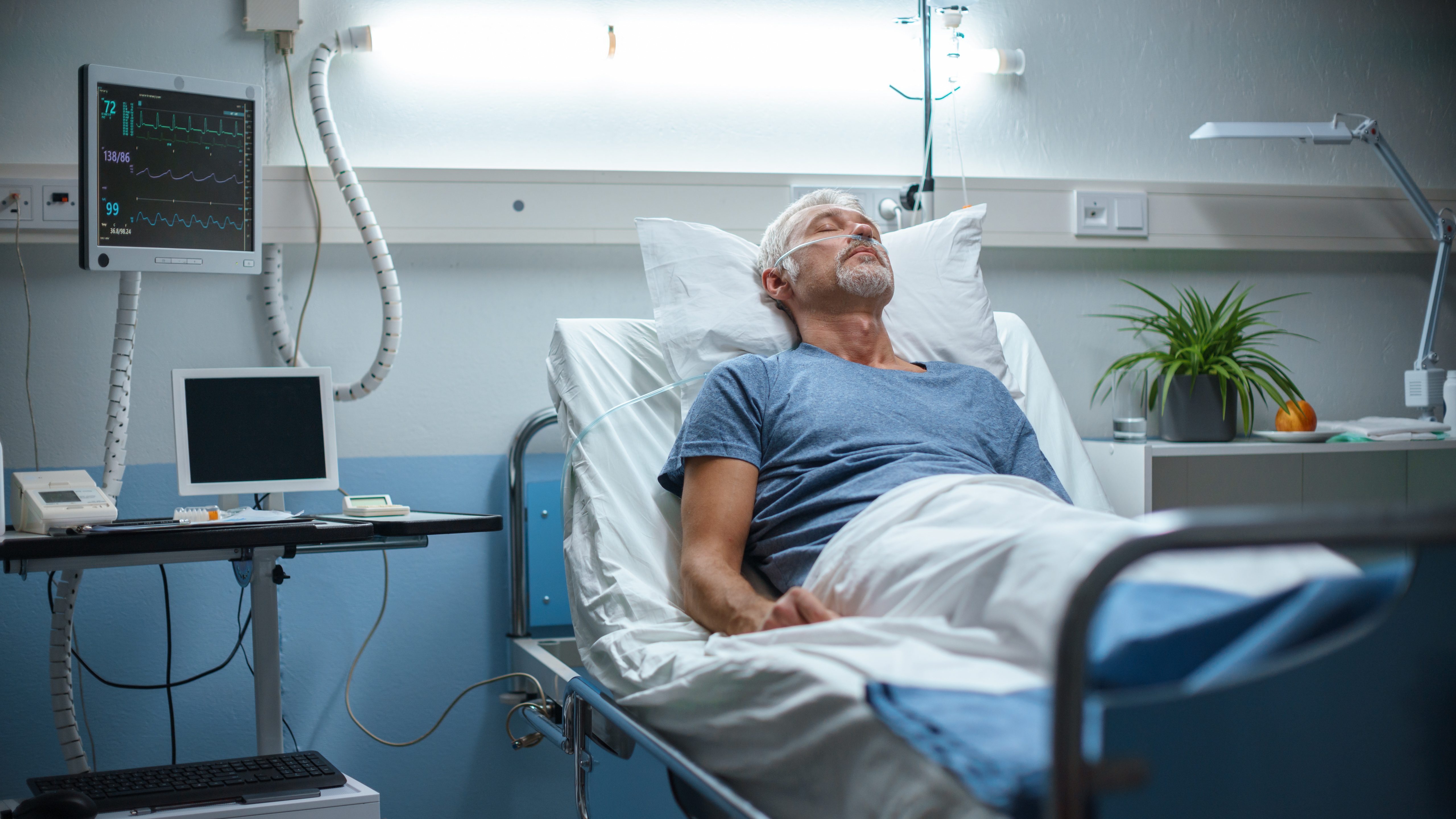 Man in hospital bed