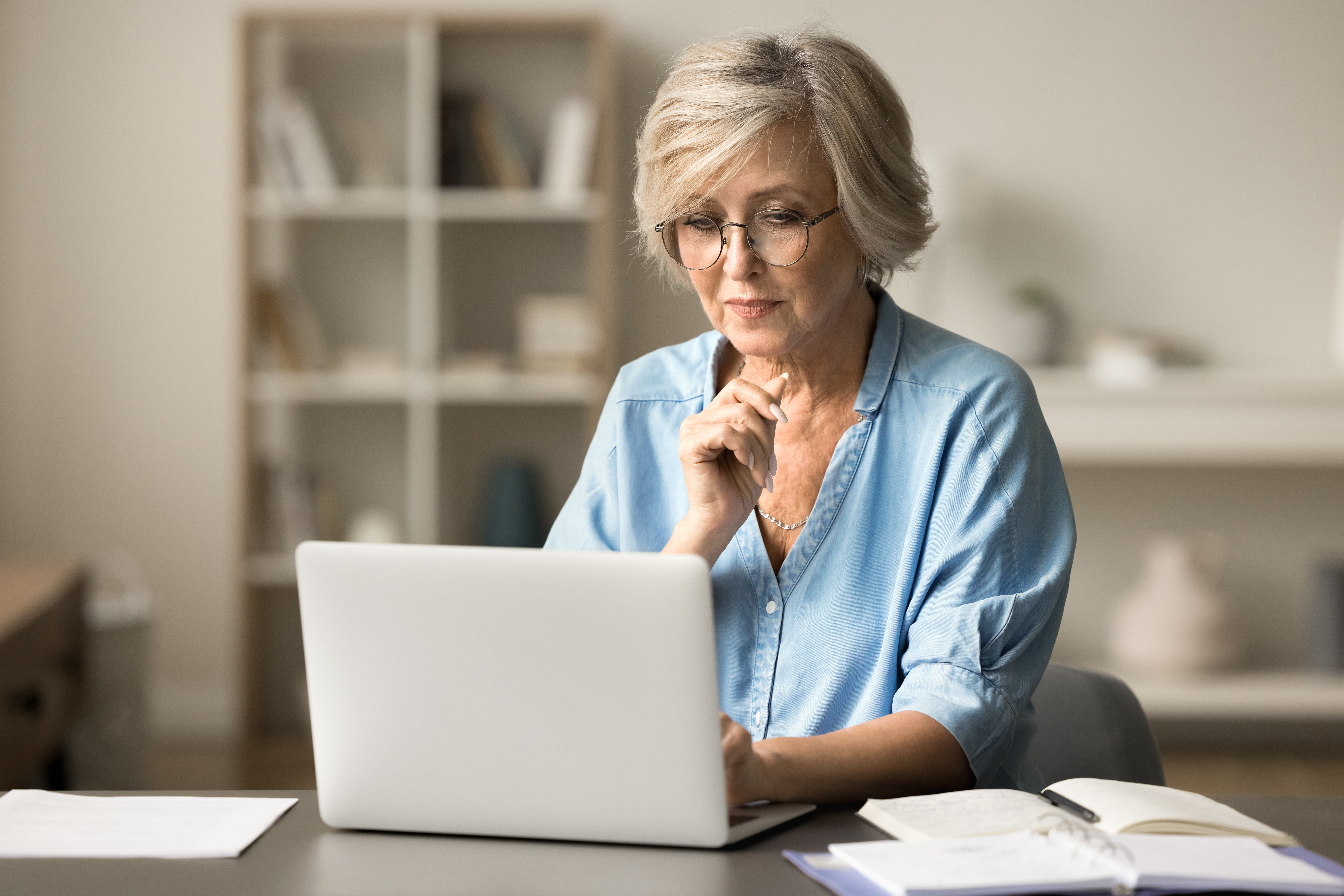 Older woman looking at computer