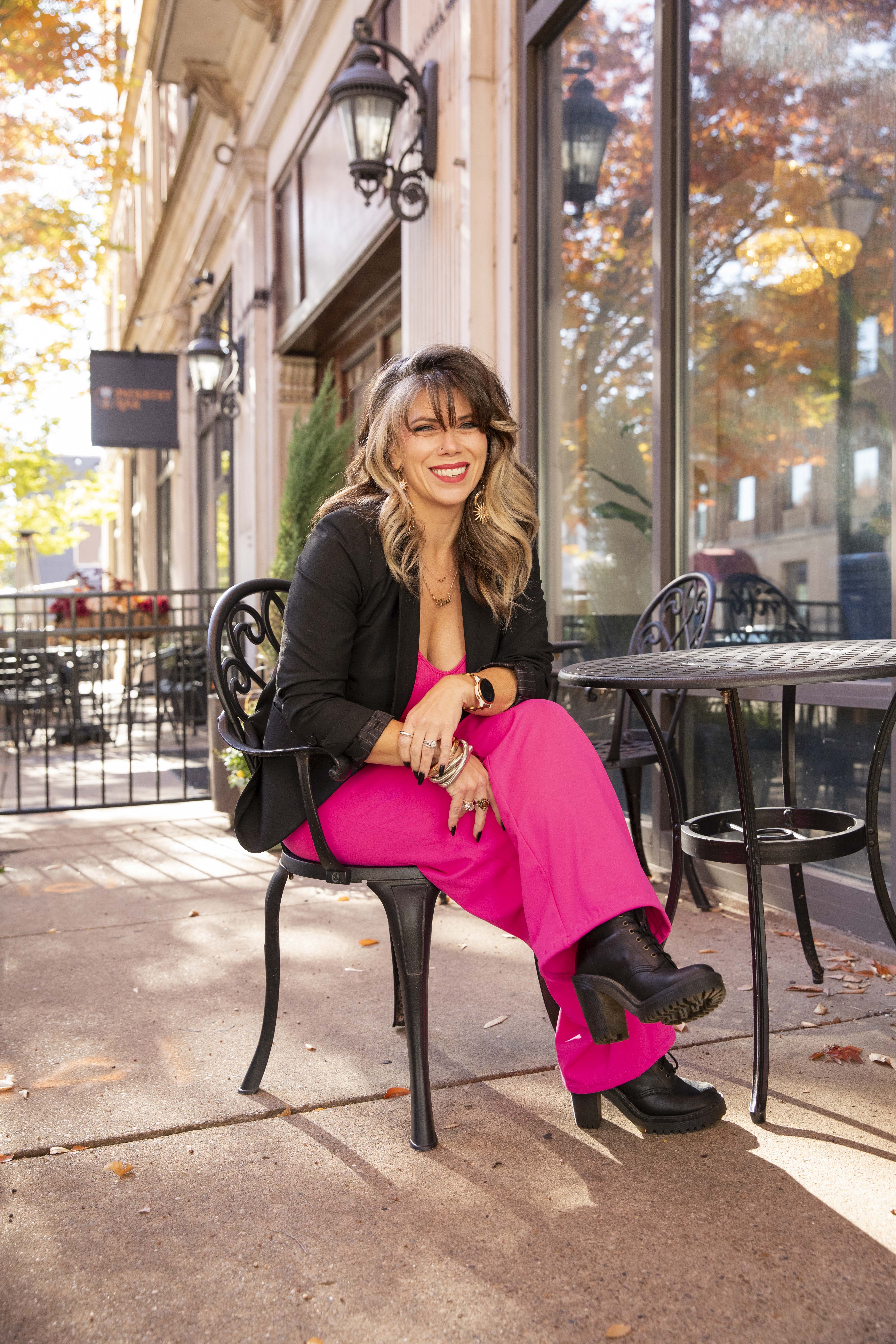 Adviser sitting on the sidewalk