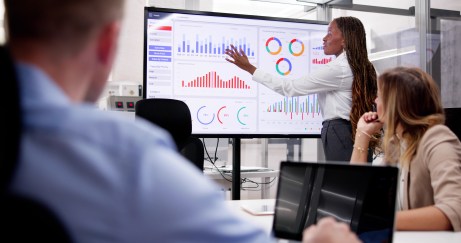 Woman presenting data in meeting