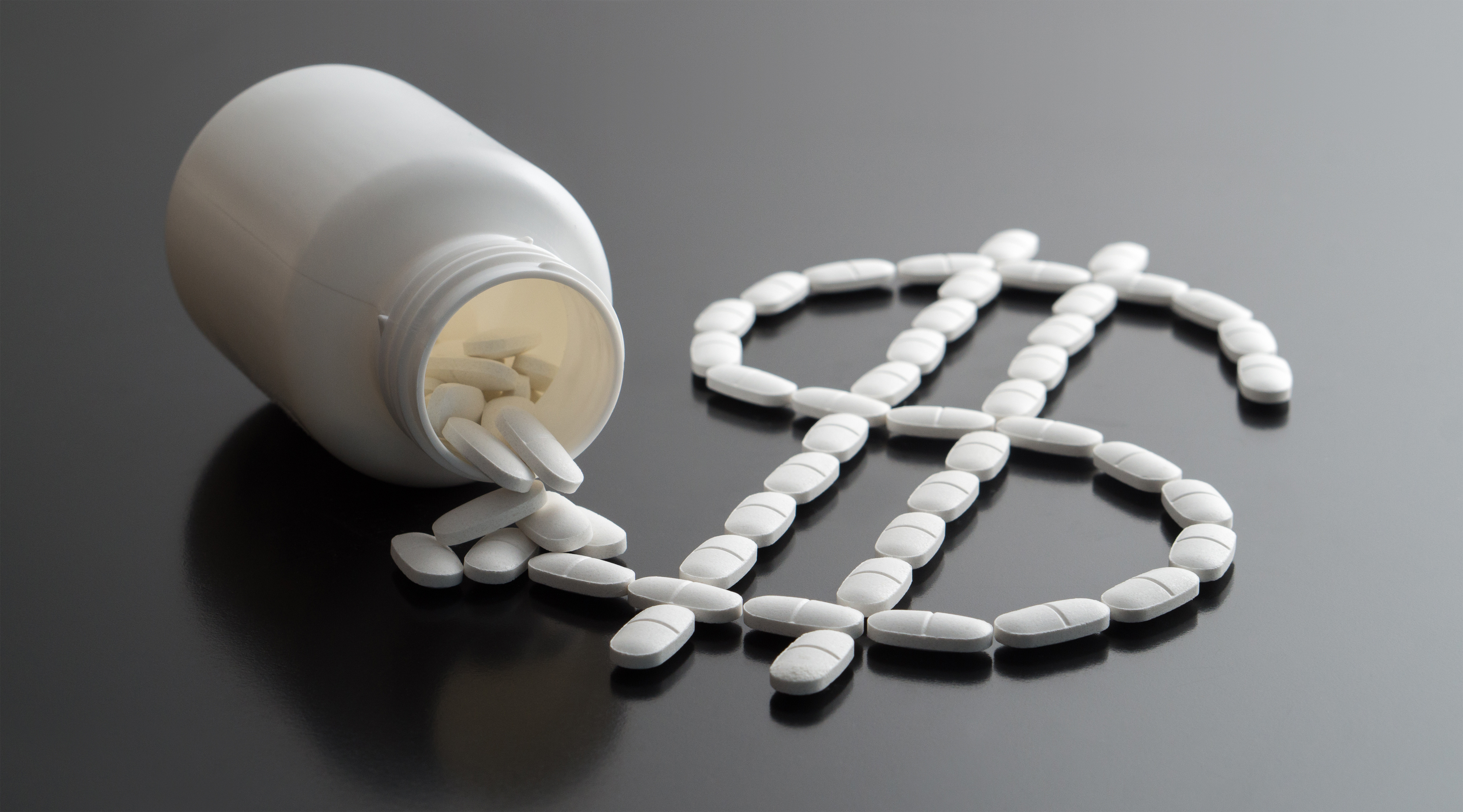 Pills forming dollar sign