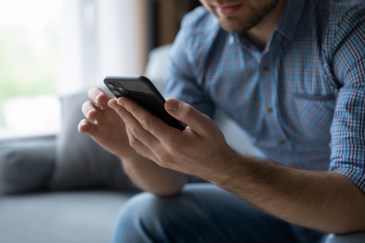 Man looking at cell phone