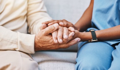 Nurse, hands and senior patient in empathy, safety and support of help, trust and healthcare consulting. Nursing home, counseling and gratitude for medical caregiver, client and hope in consultation.