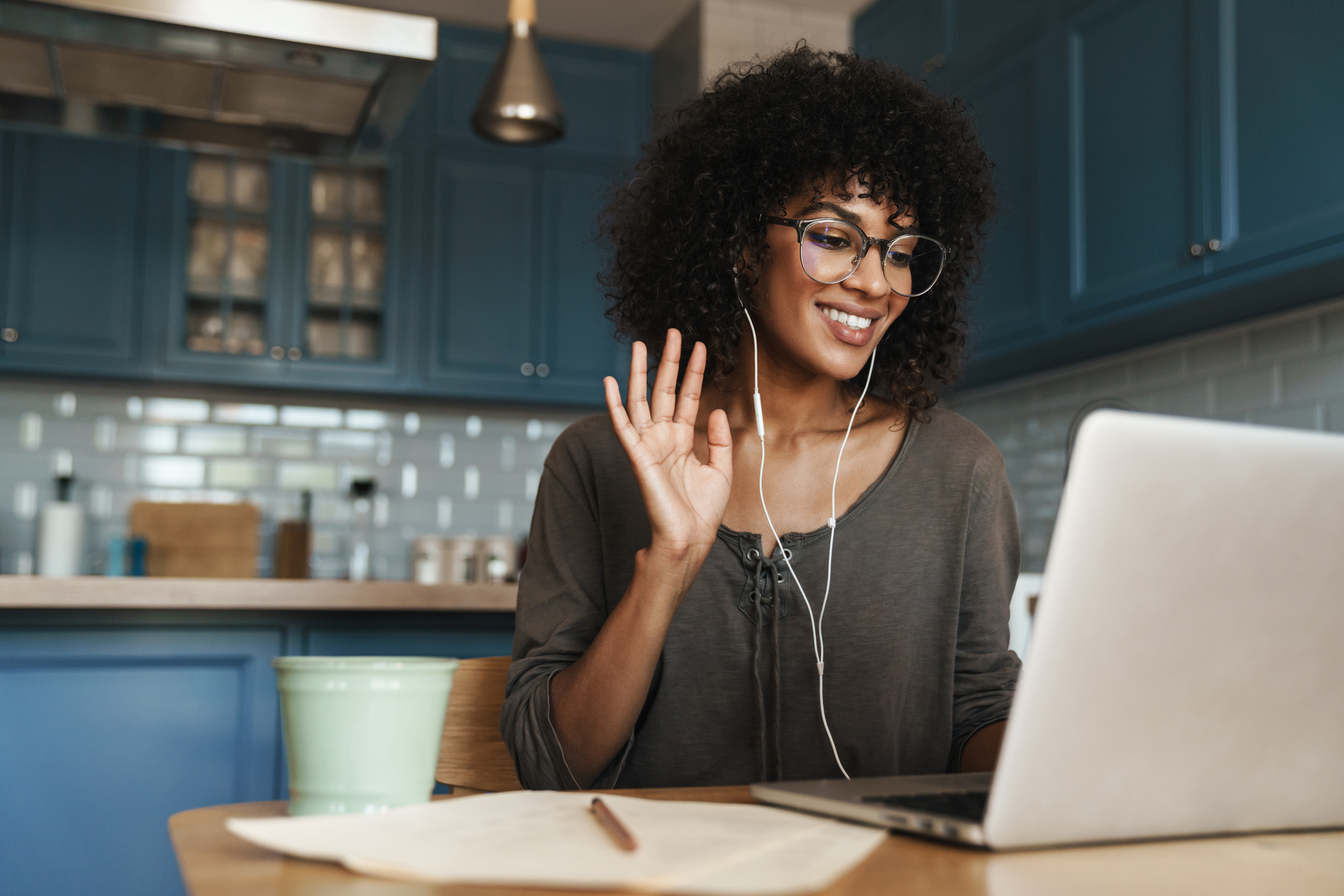 Woman talking on video call on laptop