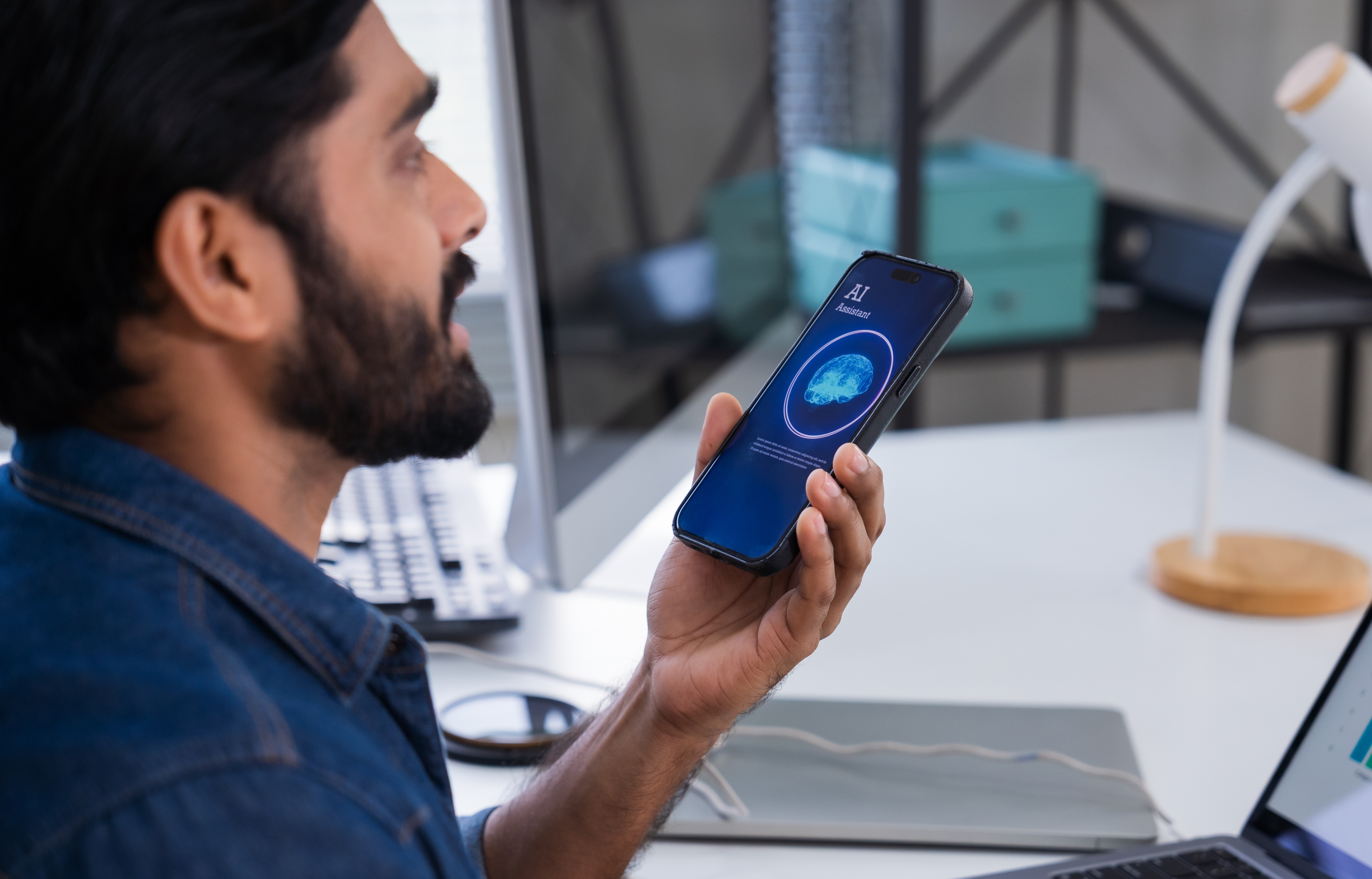 Man speaking into phone, using AI