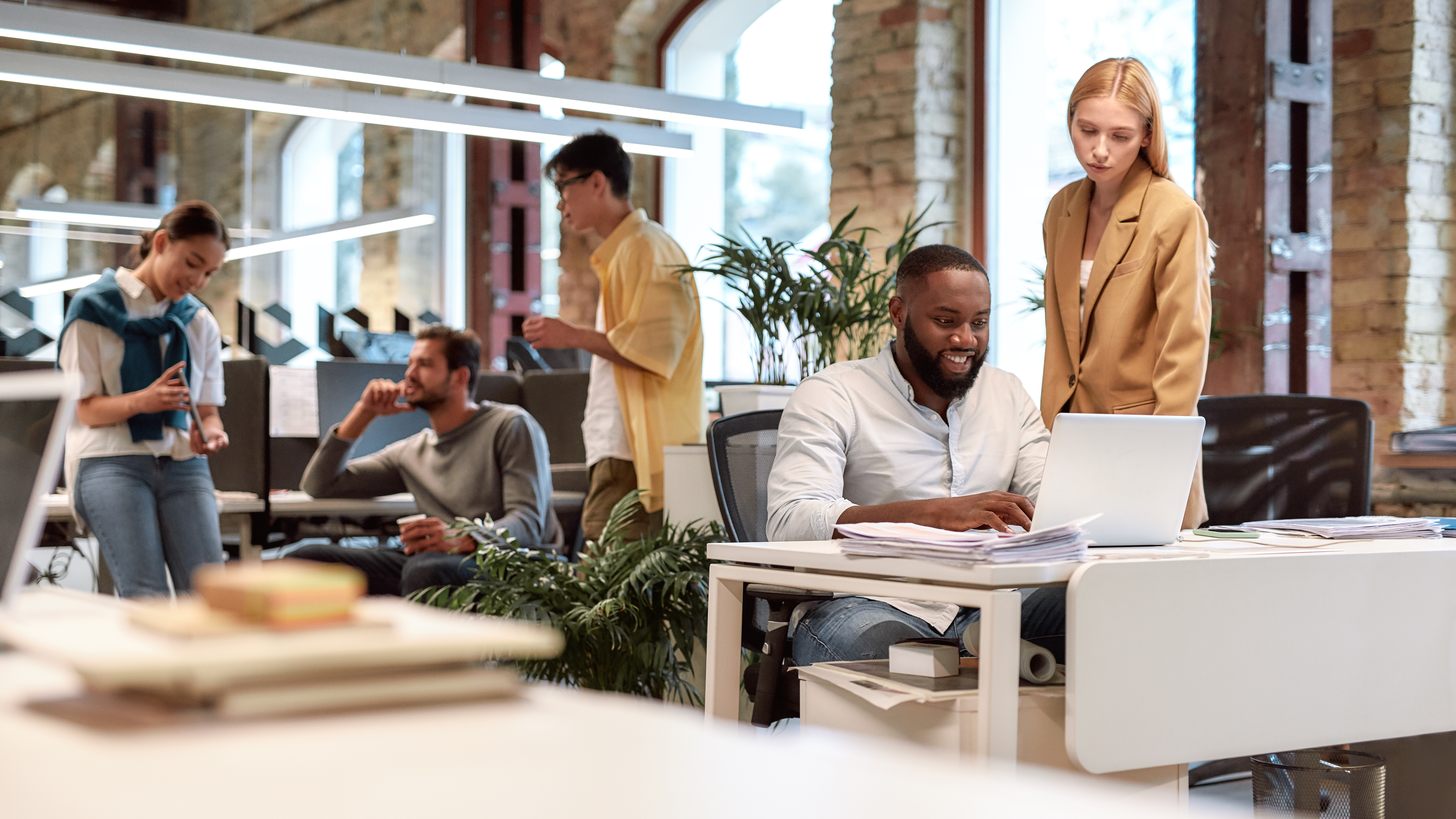 Group of employees working in office