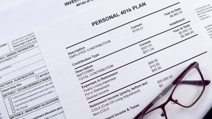 Pension savings. Glasses and pen are on the background Blank form Investment contract 401(k) or 457 plan, blank form Utah retirement system 401 k and Personal 401k plan.