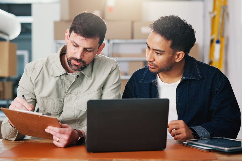 Review, checklist or people in office of small business, sales progress or parcel shipping for logistics. Check report, entrepreneur team or men planning for order fulfillment, delivery or stock info.