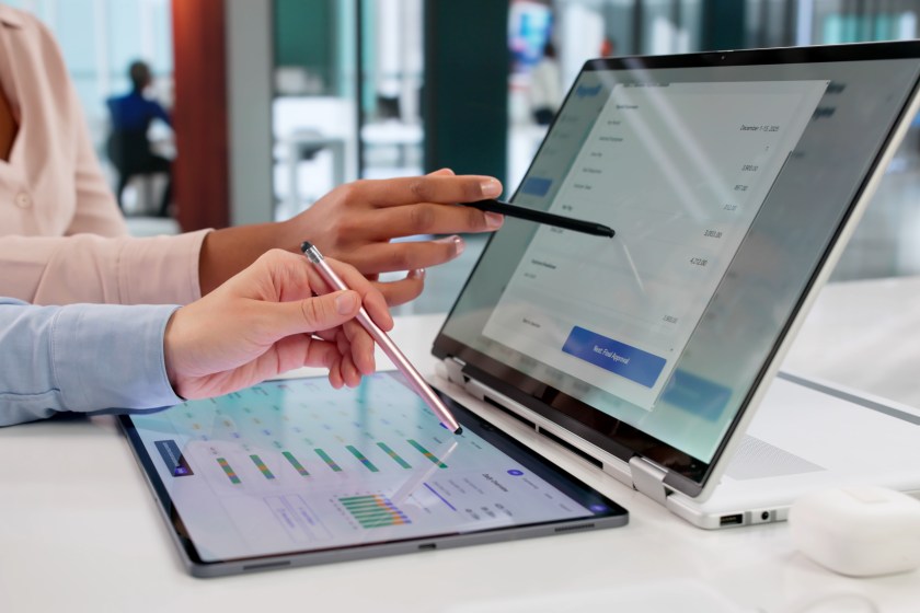 A woman with a laptop.