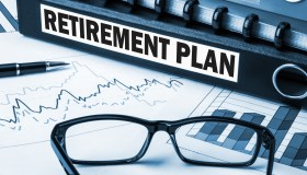 Retirement plan label on folder.