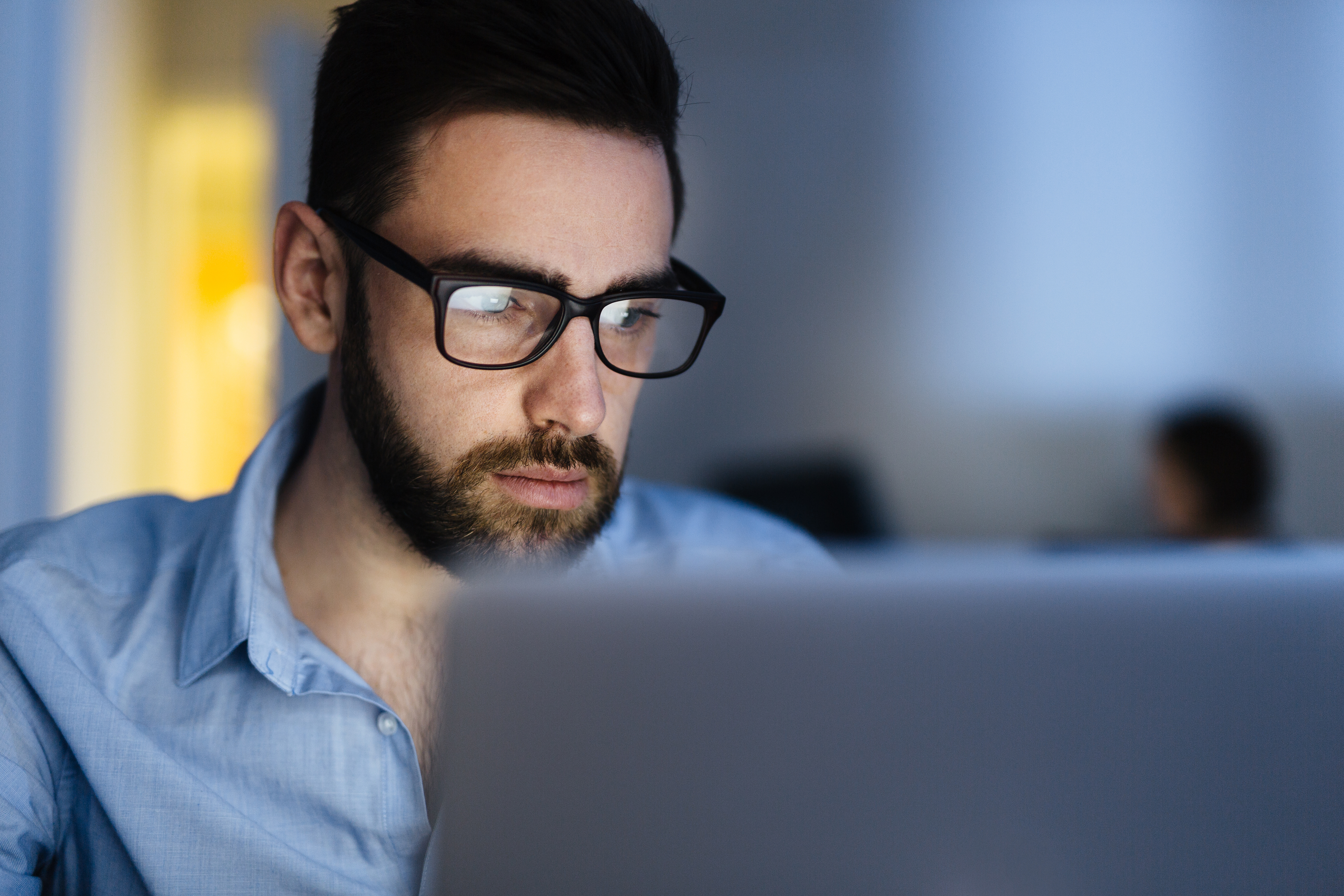 Bearded Man Busy Working Late