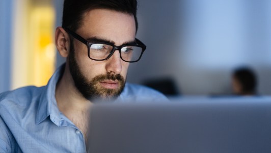 Bearded Man Busy Working Late