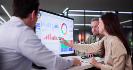 Businesswoman Managing Company Data Using Analytics Dashboard