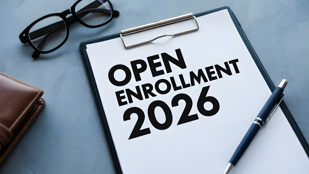 A sheet of paper that says, "Open Enrollment 2026."