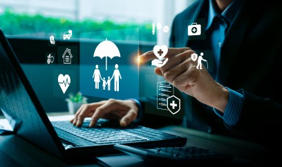 Digital insurance technology concept with businessman hand selecting family protection, health, finance, and retirement.