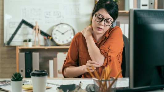 woman employee suffer shoulder pain