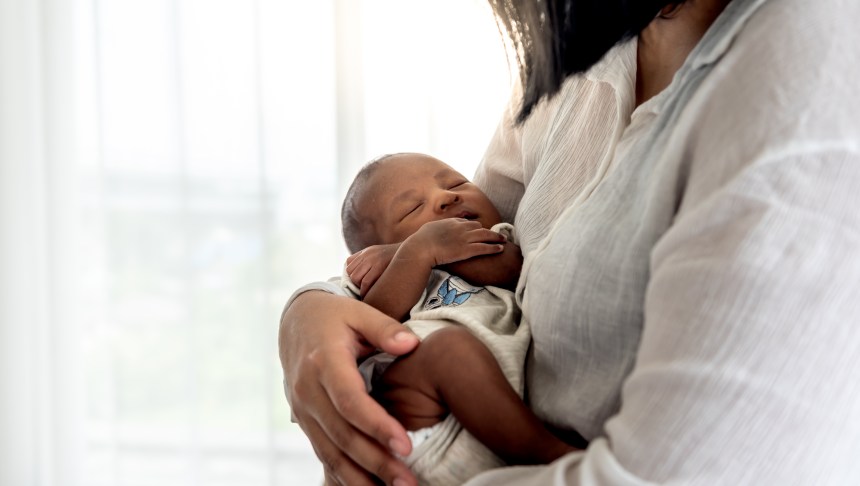 Portrait images of half African half Thai, 12-day-old baby newborn