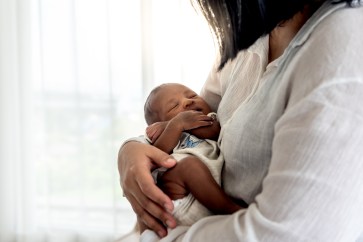 Portrait images of half African half Thai, 12-day-old baby newborn